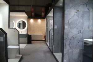 The image captures multiple bathroom display units within a showroom. Each with a unique design of tile.