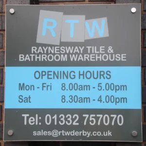 The image shows a sign that details the opening hours and contact details for Raynesway Tile & Bathroom Warehouse.